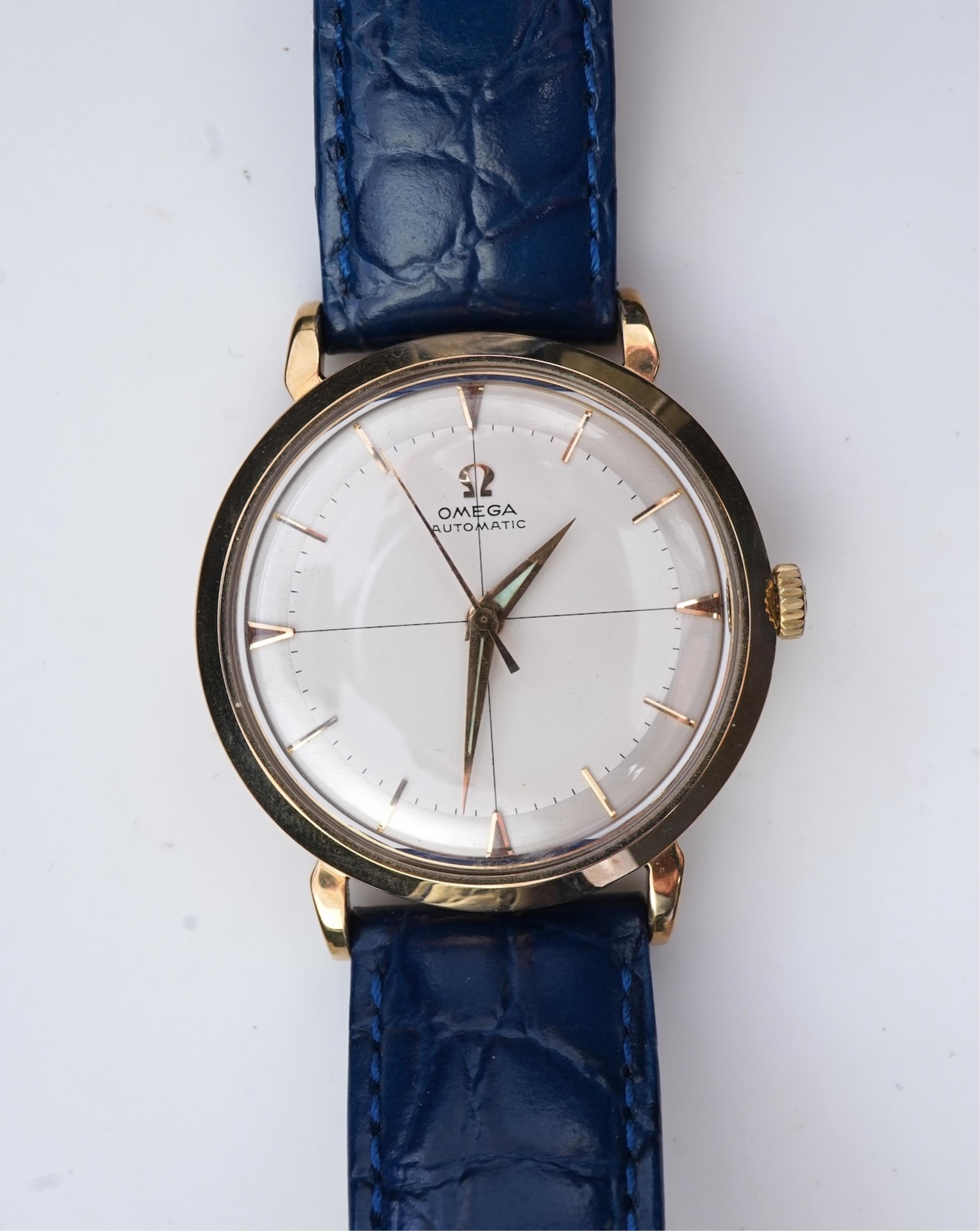 A gentleman's late 1950's 9ct gold Omega Automatic wrist watch